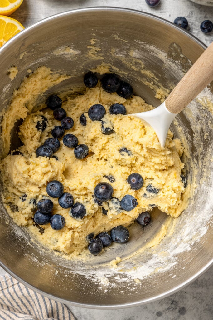 Gently folding in the blueberries. 