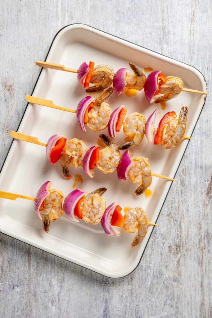 Raw, assembled skewers.